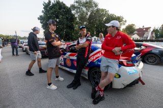 Tyler Gonzalez (left), driver of the #57 Copeland Motorsports Toyota GR86 Cup Car, and Spike Kohlbecker, driver of the #55 TechSport Racing Toyota GR86 Cup Car, during the annual parade of cars before Races 9 and 10 at Road America on August 17, 2023. -Ph | SRO Motorsports Group