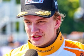 Tyler Gonzalez, driver of the #57 Copeland Motorsports Toyota GR86 Cup Car, celebrates after winning Race 9 at Road America on August 19, 2023. -Photo by Dave Biro
 | SRO Motorsports Group