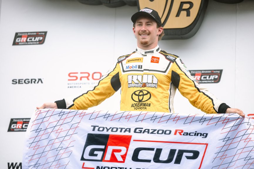 The Toyota GR Cup  Round 14 - R2 in Indianapolis, Indiana on Sunday, Oct. 19, 2025.

Win, Celebration, Podium, Victory Lane, Round 14 - R2 
Spike Kohlbecker, 55, RVA Graphics Motorsports by Speed Syndicate, Ackerman Toyota, Vanguard Commercial Power, RVA 